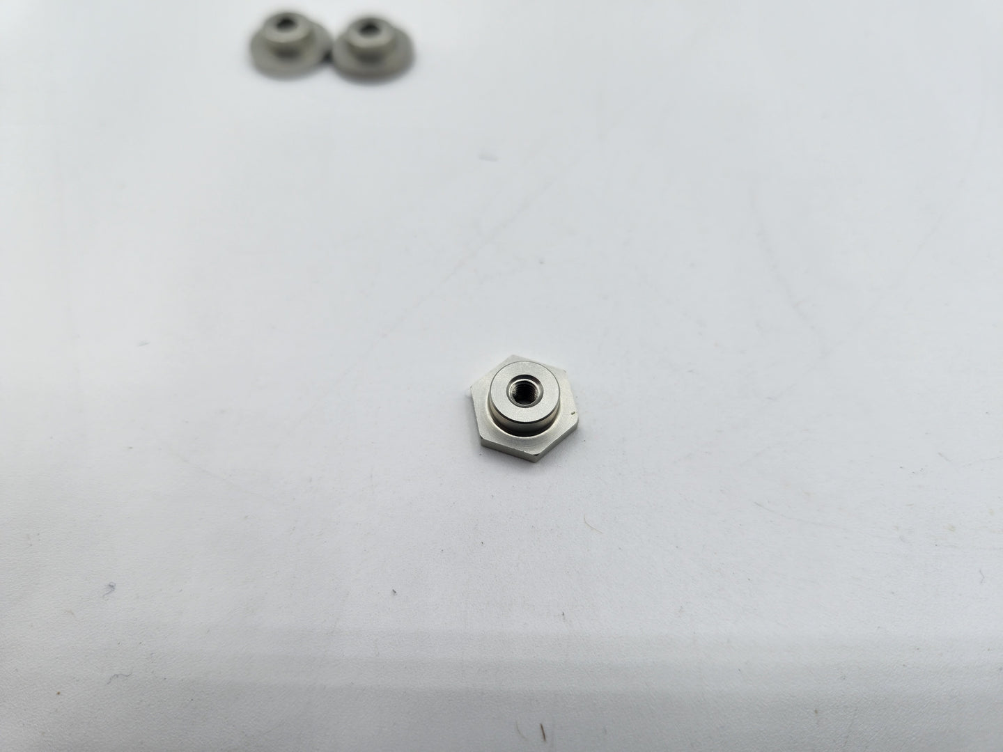 61385 ALUMINUM HAT SPACER NUT FOR FBM WITH COUNTERSINK (EACH)